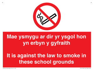 Mae ysmygu ar dir yr ysgol hon yn erbyn y gyfraith It is against the law to smoke in these school grounds - Bilingual Welsh / English